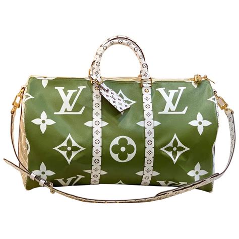 lv prism keepall bandouliere duffle|keepall 50 duffle bag.